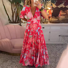 Laden Sie das Bild in den Galerie-Viewer, Taschenkleid mit Blumendruck und V-Ausschnitt