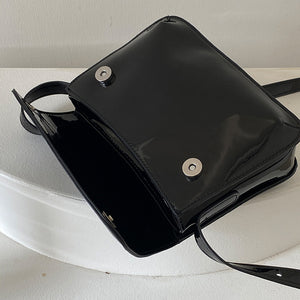Stilvolle Umhängetasche aus Lackleder