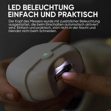Laden Sie das Bild in den Galerie-Viewer, Wiederaufladbarer Nageltrimmer mit Nagelschrottaufbewahrung