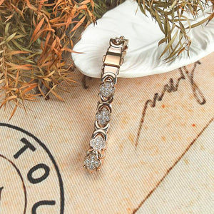 Elegantes Blumenarmband aus Kupfer