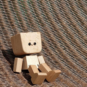 Wackelnde Holzmann-Figur