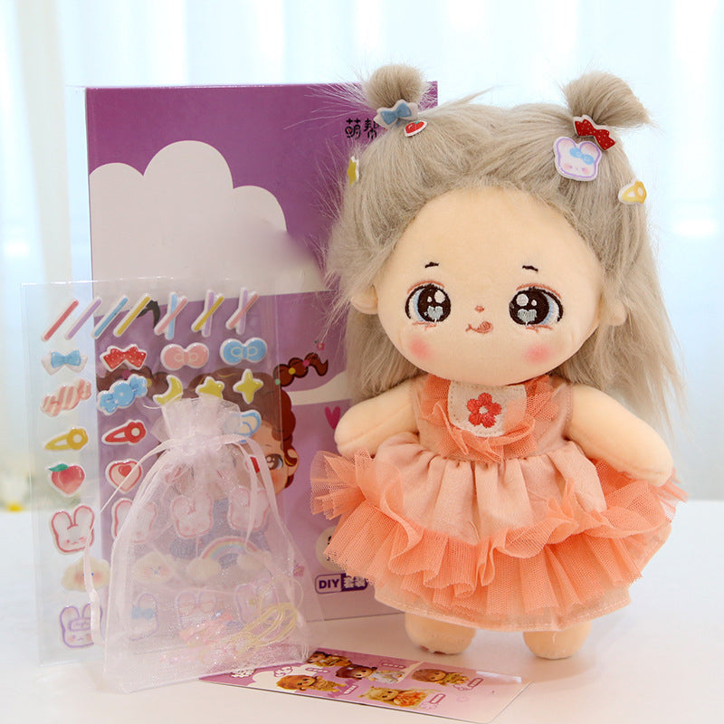 Plüschpuppe mit wechselbarer Kleidung