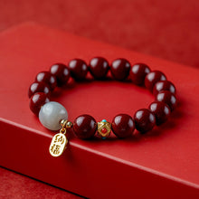 Laden Sie das Bild in den Galerie-Viewer, Glücksarmband aus Zinnober