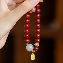 Laden Sie das Bild in den Galerie-Viewer, Glücksarmband aus Zinnober