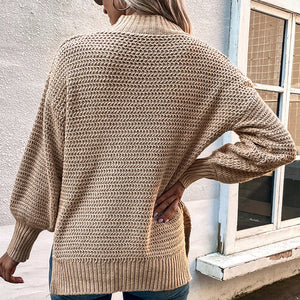 Geschlitzter Pullover mit Puffärmeln