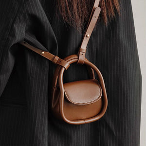 Mini-Kopfhörertasche aus einfarbigem Leder