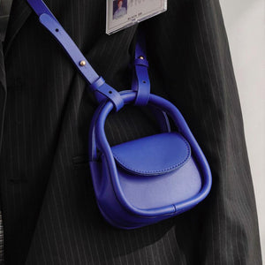 Mini-Kopfhörertasche aus einfarbigem Leder