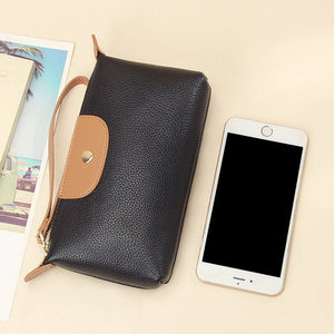 Handliche Leder-Clutch, große Geldbörse mit Reißverschluss am Handgelenk