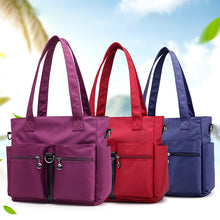 Laden Sie das Bild in den Galerie-Viewer, Damen wasserdichte Reisetasche aus Nylongewebe mit großer Kapazität