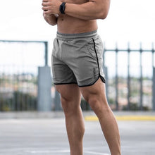 Laden Sie das Bild in den Galerie-Viewer, Einfarbige Sportshorts mit Monogramm für Herren