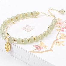 Laden Sie das Bild in den Galerie-Viewer, Armband aus Hetian-Jade mit Blatt