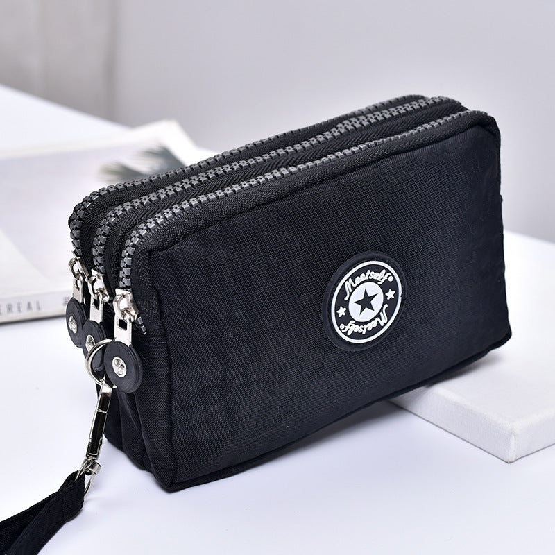 Lässige wasserdichte Handtasche mit Handgelenkschlaufe
