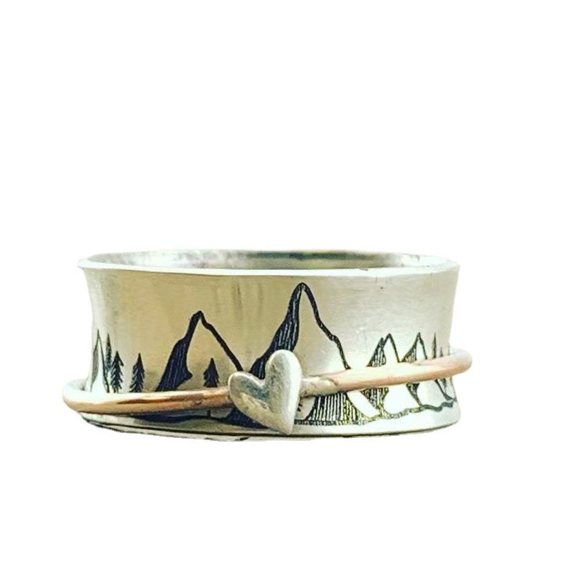 Kreativer Spinnring mit Bergmuster