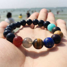 Laden Sie das Bild in den Galerie-Viewer, Buntes Armband mit Sternenhimmel des Sonnensystems