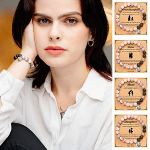 Rosafarbenes Armband mit herzförmigem Anhänger