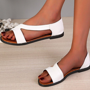 Flache Sandalen mit offener Zehenpartie und Nieten