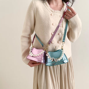 Stilvolle vielseitige Handtasche mit Perlen