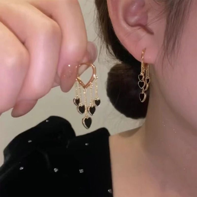 Schwarze lange Liebesquastenohrringe