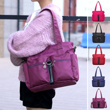 Laden Sie das Bild in den Galerie-Viewer, Damen wasserdichte Reisetasche aus Nylongewebe mit großer Kapazität