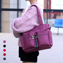 Laden Sie das Bild in den Galerie-Viewer, Damen wasserdichte Reisetasche aus Nylongewebe mit großer Kapazität