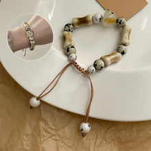 Laden Sie das Bild in den Galerie-Viewer, Welpen Keramik Armband