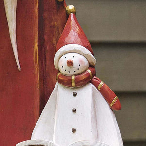 Weihnachtsmann- und Schneemann-Skulptur
