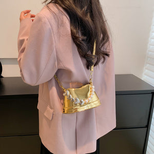 Stilvolle vielseitige Handtasche mit Perlen