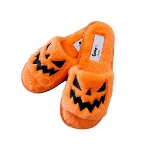 Halloween-Hausschuhe mit Kürbisgesicht