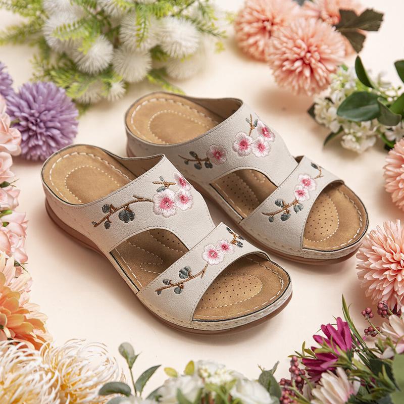 Damen handgemachte lässige hohle Blumensandalen