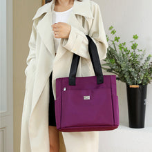 Laden Sie das Bild in den Galerie-Viewer, Vielseitige einfache einfarbige Nylonhandtasche mit großer Kapazität