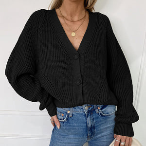 Einfarbiger Strickpullover mit Ballonärmeln und V-Ausschnitt