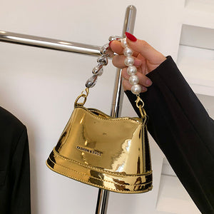 Stilvolle vielseitige Handtasche mit Perlen