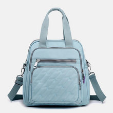 Laden Sie das Bild in den Galerie-Viewer, Multifunktionaler, leichter, eleganter Handtaschen-Umhängetaschen-Rucksack mit Prägung