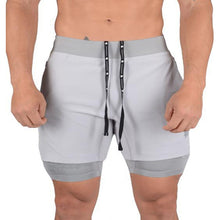 Laden Sie das Bild in den Galerie-Viewer, Schnell trocknende, doppellagige, elastische Shorts