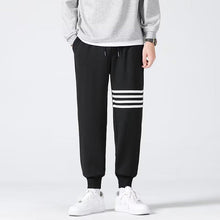 Laden Sie das Bild in den Galerie-Viewer, Lässige gestreifte Harems-Jogginghose