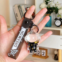 Laden Sie das Bild in den Galerie-Viewer, Kreativer Schwimmender Astronauten-Schlüsselanhänger