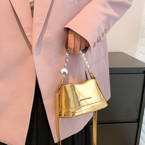 Stilvolle vielseitige Handtasche mit Perlen