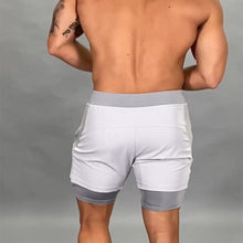 Laden Sie das Bild in den Galerie-Viewer, Schnell trocknende, doppellagige, elastische Shorts