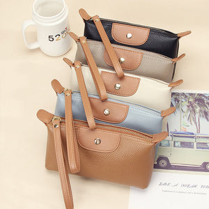 Handliche Leder-Clutch, große Geldbörse mit Reißverschluss am Handgelenk
