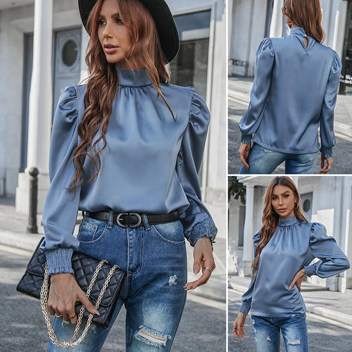 Elegante Langarmbluse mit Rollkragen und Puffärmeln