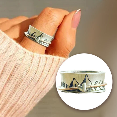 Kreativer Spinnring mit Bergmuster