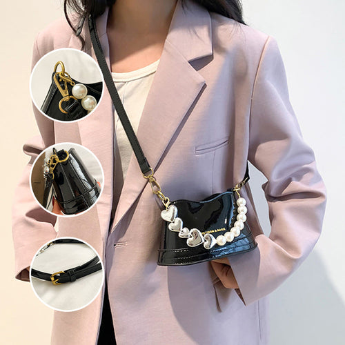 Stilvolle vielseitige Handtasche mit Perlen
