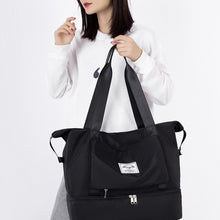 Laden Sie das Bild in den Galerie-Viewer, Faltbare wasserdichte Reisehandtasche mit großer Kapazität