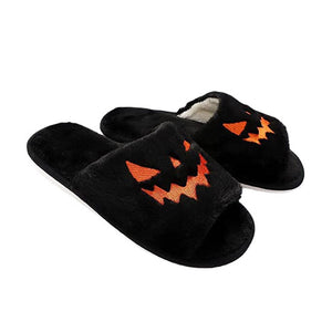 Halloween-Hausschuhe mit Kürbisgesicht