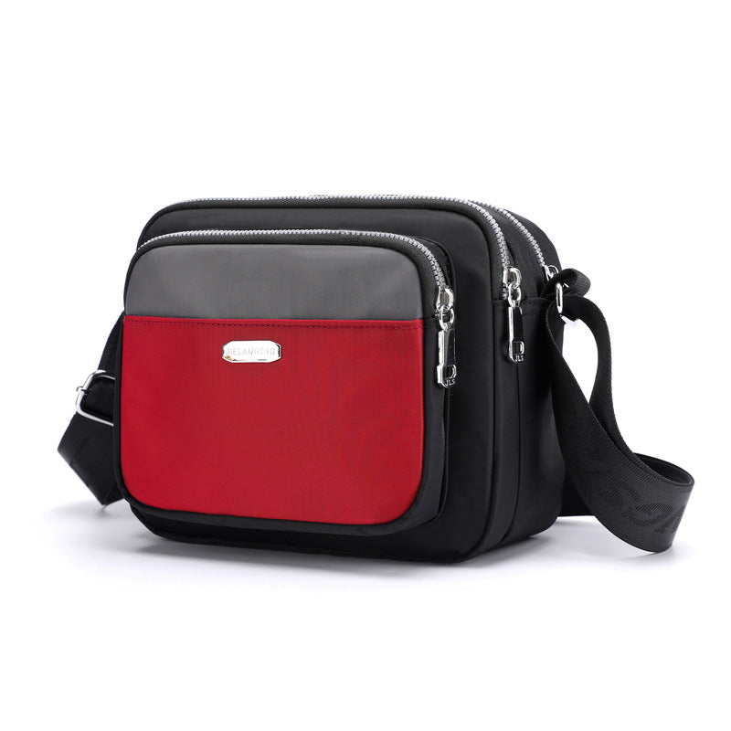 Kontrastierende lässige leichte wasserdichte Umhängetasche aus Nylon