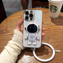 Laden Sie das Bild in den Galerie-Viewer, Astronautenhülle für iPhone mit Handschlaufe